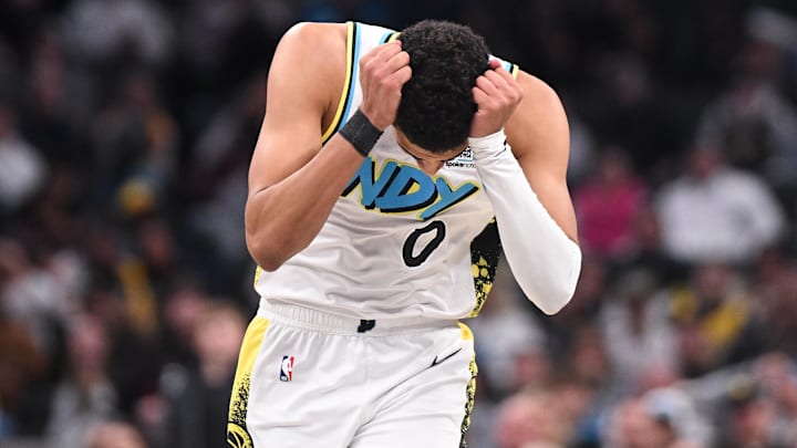Dec 8, 2024; Indianapolis, Indiana, USA; Indiana Pacers guard Tyrese Haliburton (0) reacts after a play during the second half against the Charlotte Hornets at Gainbridge Fieldhouse. Mandatory Credit: Robert Goddin-Imagn Images Dec 8, 2024; Indianapolis, Indiana, USA; Indiana Pacers guard Tyrese Haliburton (0) reacts after a play during the second half against the Charlotte Hornets at Gainbridge Fieldhouse. Mandatory Credit: Robert Goddin-Imagn Images