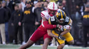 Iowa receiver Nico Ragaini is tackled by Nebraska's Javin Wright in the second quarter during a NCAA football game on Friday, Nov. 25, 2022, at Kinnick Stadium in Iowa City.
