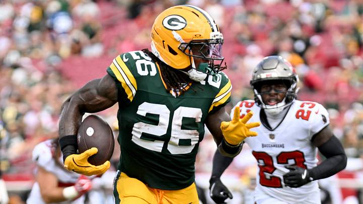 Green Bay Packers running back Kaleb Johnson (26) runs with the ball
