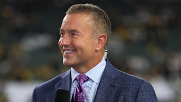 Oct 16, 2025; Cincinnati, Ohio, USA; Amazon Prime Thursday Night Football game analyst Kirk Herbstreit stands on the field during halftime of the game between the Pittsburgh Steelers and the Cincinnati Bengals at Paycor Stadium. Mandatory Credit: Katie Stratman-Imagn Images
