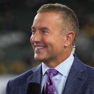 Oct 16, 2025; Cincinnati, Ohio, USA; Amazon Prime Thursday Night Football game analyst Kirk Herbstreit stands on the field during halftime of the game between the Pittsburgh Steelers and the Cincinnati Bengals at Paycor Stadium. Mandatory Credit: Katie Stratman-Imagn Images