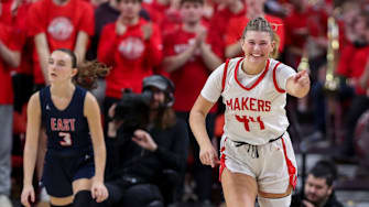 Kimberly High School's Raegan Krueger (44) points to a teammate after scoring a basket against Appleton East High School during a WIAA Division 1 state semifinal on Friday, March 14, 2025, at the Resch Center in Ashwaubenon, Wis. Kimberly won the game, 55-34.
Tork Mason/USA TODAY NETWORK-Wisconsin