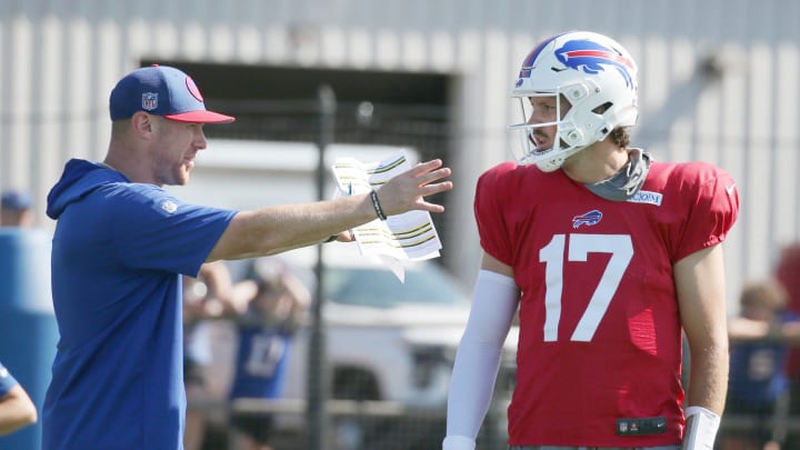 Bills quarterback Josh Allen talks with offensive coordinator Joe Brady during the Buffalo Bills training camp Wednesday, Sept. 7, 2024 at St. John Fisher University.