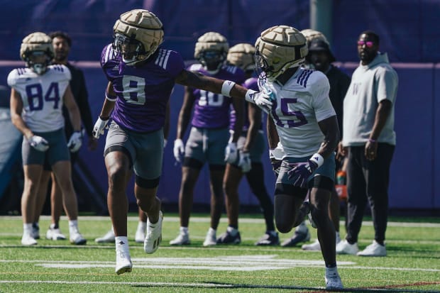 Transfer Cameron Broussard (8) was impressive at safety for the UW before injuring a hand.