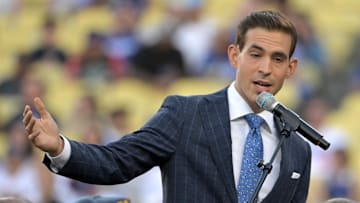 Aug 9, 2024; Los Angeles, California, USA;  Los Angeles Dodgers play-by-play broadcast announcer Joe Davis speaks during a ceremony to introduce Dusty Baker as he inducted into the Dodgers Hall of Legends prior to the game against the the Pittsburgh Pirates at Dodger Stadium. Mandatory Credit: Jayne Kamin-Oncea-Imagn Images