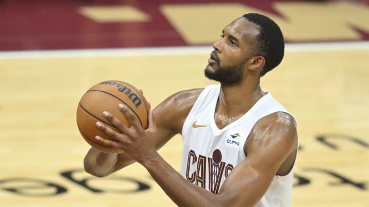 May 13, 2024; Cleveland, Ohio, USA; Cleveland Cavaliers forward Evan Mobley (4) attempts a free throw against the Boston Celtics in the third quarter of game four of the second round for the 2024 NBA playoffs at Rocket Mortgage FieldHouse. Mandatory Credit: David Richard-USA TODAY Sports