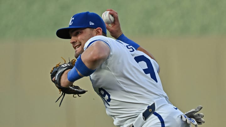 May 21, 2024; Kansas City, Missouri, USA; Kansas City Royals second baseman Michael Massey (19) throws the ball to first base for an out in the fourth inning against the Detroit Tigers at Kauffman Stadium.