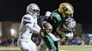 Hamilton's Keaton Fields (23) tackles Basha's Jaden Baldwin (2) during their matchup last week.