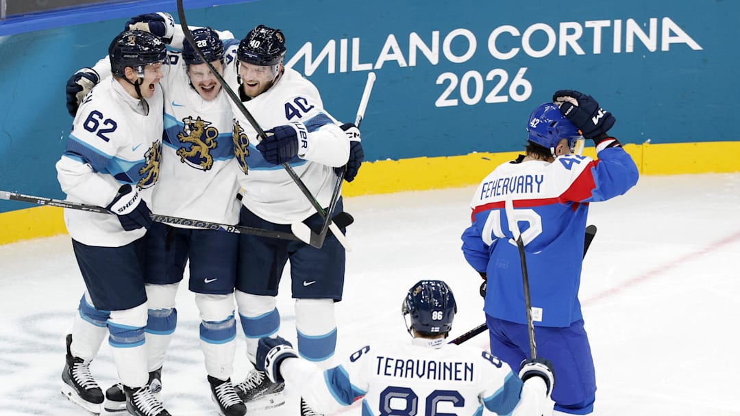 [US, Mexico & Canada customers only] Feb 11, 2026; Milan, Italy;  Eeli Tolvanen of Finland celebrates scoring their first goal with Artturi Lehkonen, Joel Armia and Teuvo Teravainen against Slovakia in men's ice hockey group B play during the Milano Cortina 2026 Olympic Winter Games at Milano Santagiulia Ice Hockey Arena. Mandatory Credit: David W Cerny/Reuters via Imagn Images