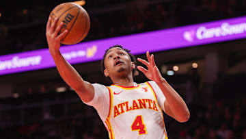 Atlanta Hawks guard Kobe Bufkin (4) shoots against the New Orleans Pelicans in the second quarter at State Farm Arena.