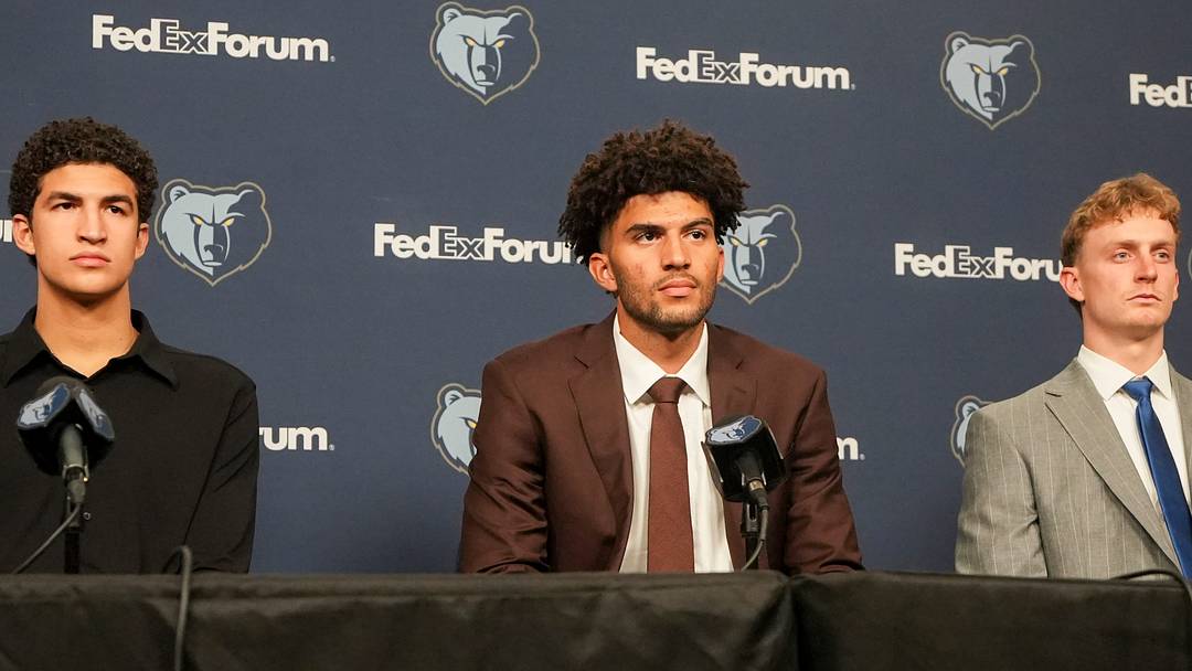 Grizzlies 2026 draft picks Karim Lopez, Cam Boozer and Richie Saunders listen to questions from the media during their introductory press conference at FedExForum in Memphis, Tenn., on June 25, 2026.