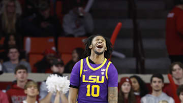 Guard Wes Enis joined former LSU standout Daimian Collins at USF as new coach Bryan Hodgson continues to build a team capable of competing for a title in the American Athletic Conference.