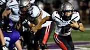 Thompson quarterback Trent Seaborn (12) runs the ball against Lipscomb Academy during an high school football game Thursday, Aug. 29, 2024, in Nashville, Tenn.