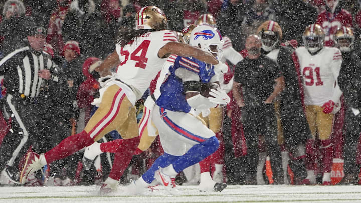 Dec 1, 2024; Orchard Park, New York, USA; San Francisco 49ers linebacker Fred Warner (54) tackles Buffalo Bills tight end Quintin Morris (85) during the first half at Highmark Stadium. Mandatory Credit: Gregory Fisher-Imagn Images Dec 1, 2024; Orchard Park, New York, USA; San Francisco 49ers linebacker Fred Warner (54) tackles Buffalo Bills tight end Quintin Morris (85) during the first half at Highmark Stadium. Mandatory Credit: Gregory Fisher-Imagn Images