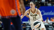 Jun 10, 2024; Uncasville, Connecticut, USA; Indiana Fever guard Caitlin Clark (22) drives the ball against the Connecticut Sun in the second half at Mohegan Sun Arena. Mandatory Credit: David Butler II-USA TODAY Sports