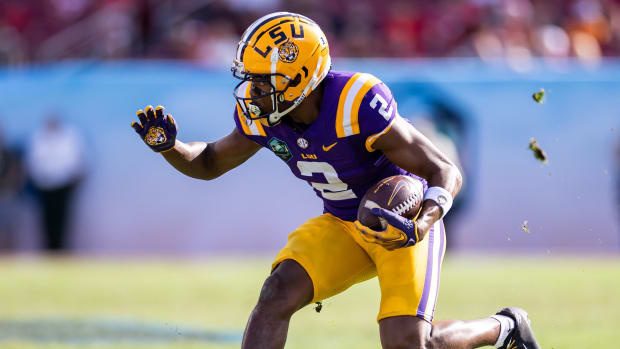 LSU Tigers wide receiver Kyren Lacy catches a pass during a college football game in the SEC.