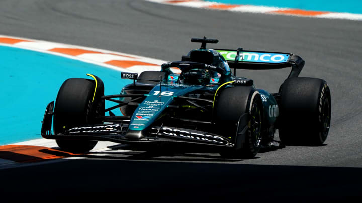 May 3, 2024; Miami Gardens, Florida, USA; Aston Martin driver Lance Stroll (18) races into turn three during F1 practice at Miami International Autodrome. Mandatory Credit: John David Mercer-USA TODAY Sports