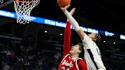Penn State Nittany Lions forward Yanic Konan Niederhauser (14) attempts to tip the ball into the basket during the first half against the Nebraska Cornhuskers at Bryce Jordan Center.