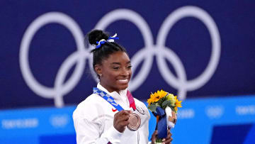 Aug 3, 2021; Tokyo, Japan; Simone Biles (USA) celebrates winning the bronze medal on the balance beam during the Tokyo 2020 Olympic Summer Games at Ariake Gymnastics Centre. Mandatory Credit: Robert Deutsch-USA TODAY Sports