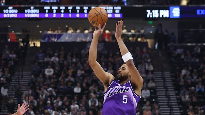 Dec 18, 2023; Salt Lake City, Utah, USA; Utah Jazz guard Talen Horton-Tucker (5) makes a three point shot against the Brooklyn Nets during the first quarter at Delta Center. Mandatory Credit: Rob Gray-Imagn Images