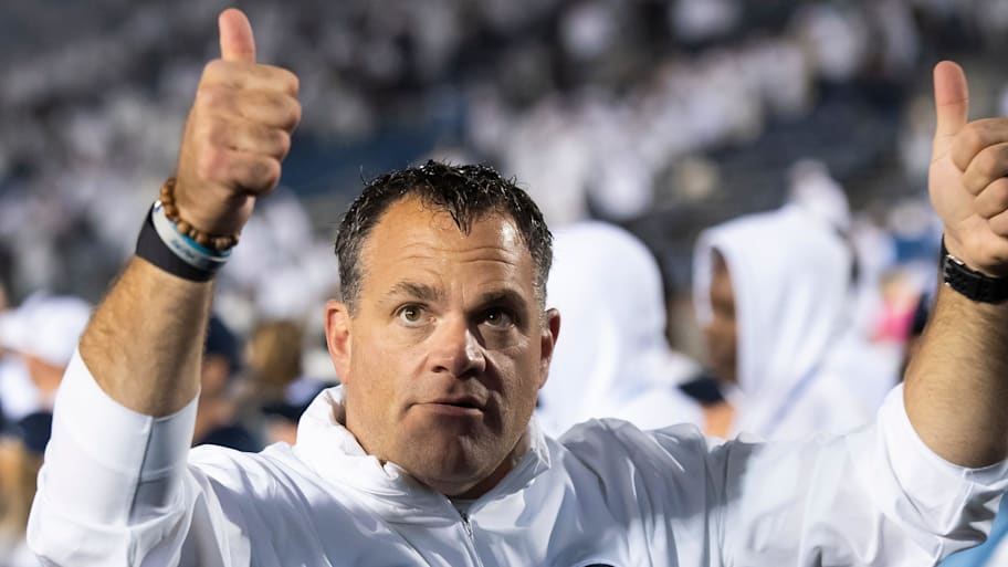 Penn State AD Pat Kraft gives two thumbs up to the student section following a 31-0 White Out football win against Iowa.