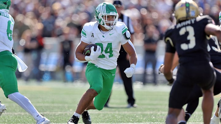 Sep 20, 2025; West Point, New York, USA; North Texas Mean Green running back Caleb Hawkins (24) runs for a touchdown against the Army Black Knights during the second half at Michie Stadium. Mandatory Credit: Danny Wild-Imagn Images