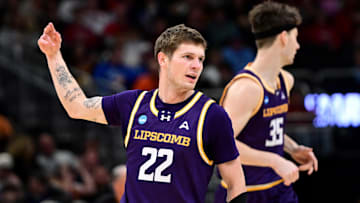 Mar 21, 2025; Milwaukee, WI, USA; Lipscomb Bisons guard Joe Anderson (22) reacts after a basket during the first half of a first round NCAA men’s tournament game against the Iowa State Cyclones at Fiserv Forum. Mandatory Credit: Benny Sieu-Imagn Images