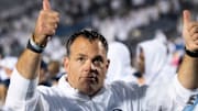 Penn State athletic director Pat Kraft gives two thumbs up to the students after a Nittany Lions win at Beaver Stadium. 