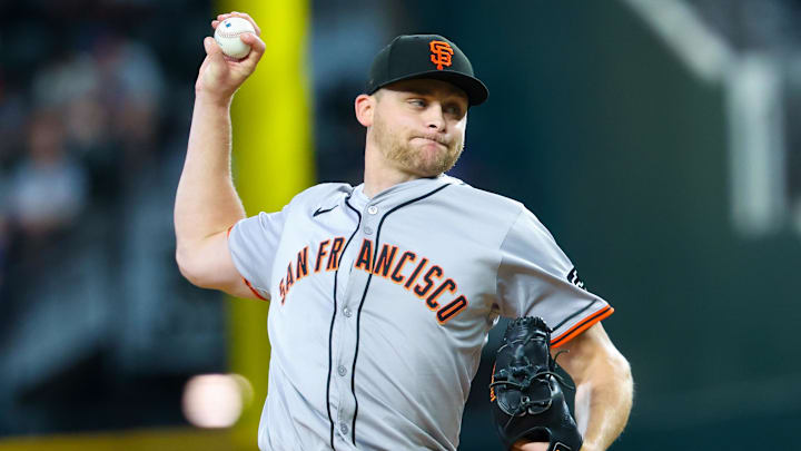 Jun 9, 2024; Arlington, Texas, USA; San Francisco Giants starting pitcher Keaton Winn (67) throws during the fourth inning against the Texas Rangers at Globe Life Field.