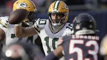 Green Bay Packers quarterback Jordan Love (10) runs for a first down during the third quarter of their game Sunday, November 17, 2024 at Soldier Field in Chicago, Illinois. 