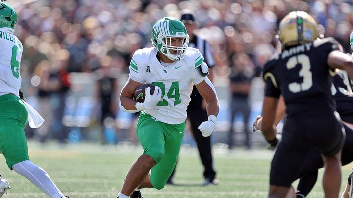 Sep 20, 2025; West Point, New York, USA; North Texas Mean Green running back Caleb Hawkins (24) runs for a touchdown against the Army Black Knights during the second half at Michie Stadium. Mandatory Credit: Danny Wild-Imagn Images