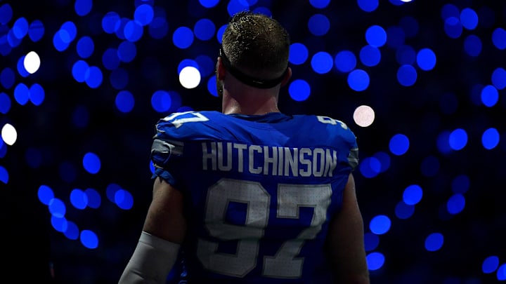 Sep 8, 2024; Detroit, Michigan, USA; Detroit Lions defensive end Aidan Hutchinson (97) is framed by the light show in the stands during a time out in the action against the Los Angeles Rams in the fourth quarter at Ford Field.