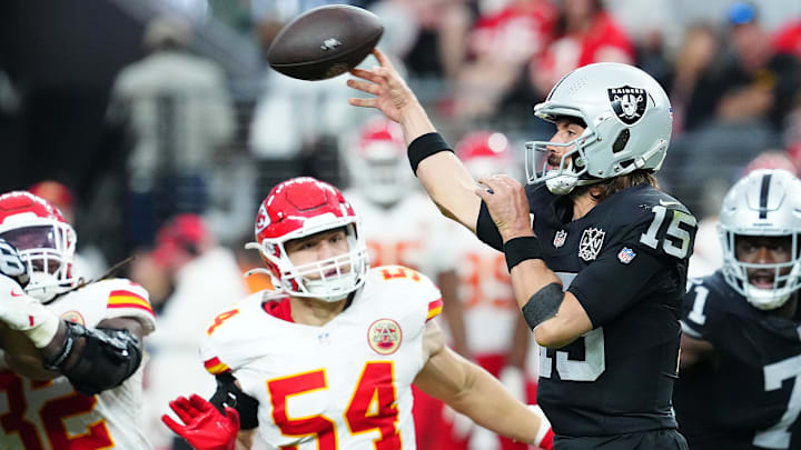 Oct 27, 2024; Paradise, Nevada, USA; Las Vegas Raiders quarterback Gardner Minshew (15) makes a pass attempt against the Kansas City Chiefs during the fourth quarter at Allegiant Stadium. Mandatory Credit: Stephen R. Sylvanie-Imagn Images