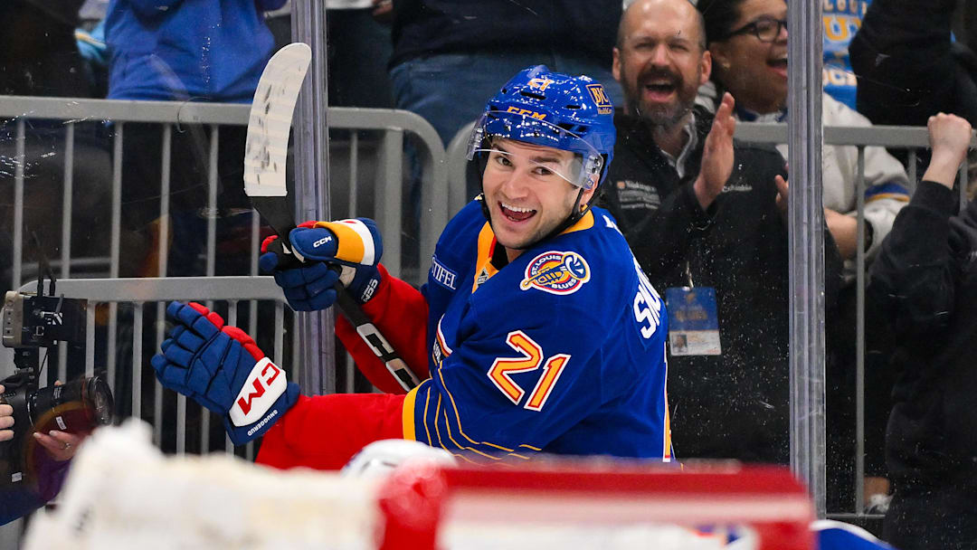 Mar 10, 2026; St. Louis, Missouri, USA; St. Louis Blues right wing Jimmy Snuggerud (21) reacts after scoring against the New York Islanders during the second period at Enterprise Center. Mandatory Credit: Jeff Curry-Imagn Images