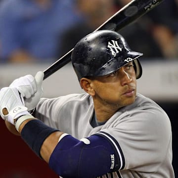 Toronto, ON, Canada; New York Yankees third baseman Alex Rodriguez (13) bats against the Toronto Blue Jays at the Rogers Centre. The Yankees beat the Blue Jays 4-3.