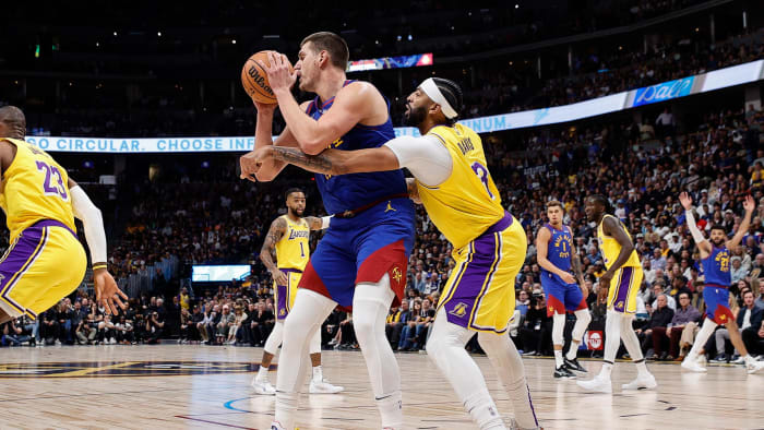 Oct 24, 2023; Denver, Colorado, USA; Denver Nuggets center Nikola Jokic (15) controls the ball under