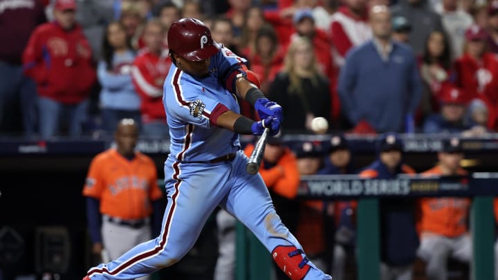 Nov 3, 2022; Philadelphia, Pennsylvania, USA; Philadelphia Phillies second baseman Jean Segura (2) hits a RBI single against the Houston Astros during the eighth inning in game five of the 2022 World Series at Citizens Bank Park.