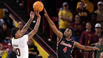 Arizona State's BJ Freeman attempts to shoot over Houston's L.J. Cryer during the Sun Devils' 80-65 loss to the No. 5-ranked Cougars on Tuesday, Feb. 18, 2025.