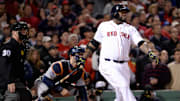 Ortiz hits a grand slam against the Tigers during the 8th inning in the ALCS.