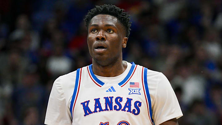 Dec 31, 2024; Lawrence, Kansas, USA; Kansas Jayhawks forward Flory Bidunga (40) reacts during the second half against the West Virginia Mountaineers at Allen Fieldhouse. Mandatory Credit: Jay Biggerstaff-Imagn Images
