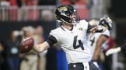 Aug 27, 2022; Atlanta, Georgia, USA; Jacksonville Jaguars quarterback E.J. Perry (4) throws the ball against the Atlanta Falcons in the first half at Mercedes-Benz Stadium. Mandatory Credit: Brett Davis-USA TODAY Sports