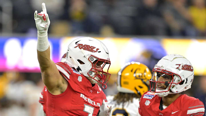 Dec 18, 2024; Inglewood, CA, USA; UNLV Rebels linebacker Jackson Woodard (7) and defensive back Cameron Oliver (5) celebrate after a play in the first half against the California Golden Bears at SoFi Stadium.