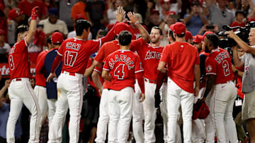 Aug 13, 2022; Anaheim, California, USA;  Los Angeles Angels right fielder Taylor Ward (3) high-fives