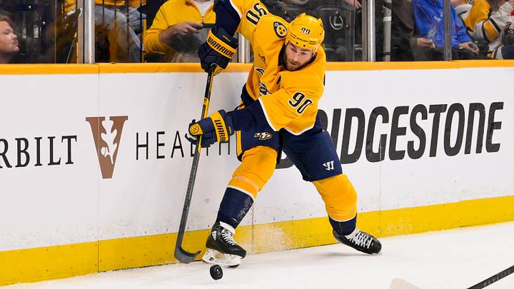 Mar 28, 2026; Nashville, Tennessee, USA;  Nashville Predators center Ryan O'Reilly (90) skates behind the net against the Montreal Canadiens during the third period at Bridgestone Arena. Mandatory Credit: Steve Roberts-Imagn Images