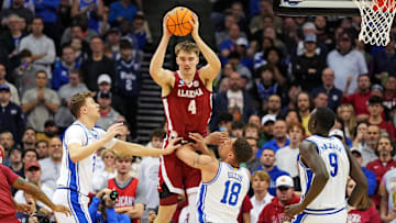 Mar 29, 2025; Newark, NJ, USA; Alabama Crimson Tide forward Grant Nelson (4) passes the ball against Duke Blue Devils forward Mason Gillis (18) during the second half in the East Regional final of the 2025 NCAA tournament at Prudential Center. Mandatory Credit: Robert Deutsch-Imagn Images