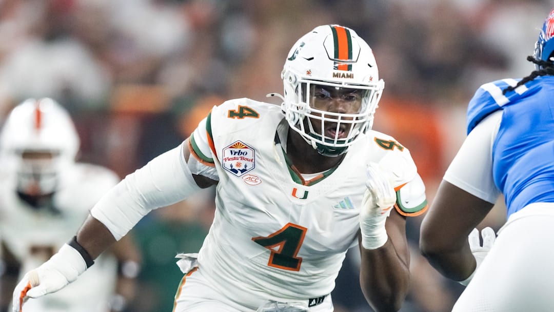 Jan 8, 2026; Glendale, AZ, USA; Miami Hurricanes defensive lineman Rueben Bain Jr. (4) against the Mississippi Rebels during the 2026 Fiesta Bowl and semifinal game of the College Football Playoff at State Farm Stadium. Mandatory Credit: Mark J. Rebilas-Imagn Images