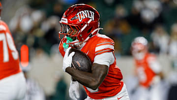 UNLV Rebels running back Jai'Den Thomas (9) runs the ball in the third quarter against the Colorado State Rams at Sonny Lubick Field at Canvas Stadium. Mandatory Credit: Isaiah J. Downing-Imagn Images