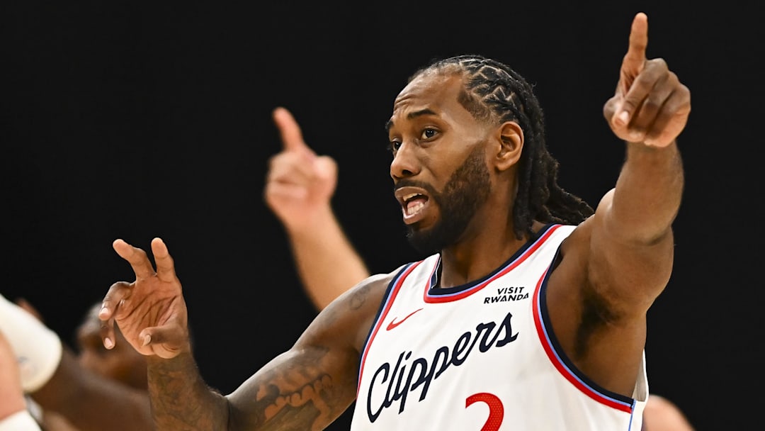 Oct 12, 2025; Inglewood, California, USA; LA Clippers forward Kawhi Leonard (2) points after the ref makes a call against the Denver Nuggets during the second quarter at Intuit Dome.
