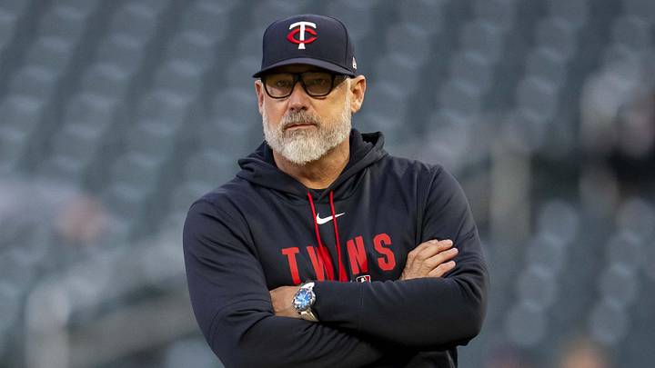 May 18, 2026; Minneapolis, Minnesota, USA; Minnesota Twins manager Derek Shelton looks on while starting pitcher Kendry Rojas (60) throws a warm up pitch during a injury timeout against the Houston Astros in the second inning at Target Field. Mandatory Credit: Jesse Johnson-Imagn Images