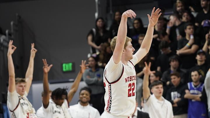Feb 1, 2025; Evanston, Illinois, USA; Wisconsin Badgers forward Steven Crowl (22) gestures after making a three point basket against the Northwestern Wildcats during the second half at Welsh-Ryan Arena. Mandatory Credit: David Banks-Imagn Images